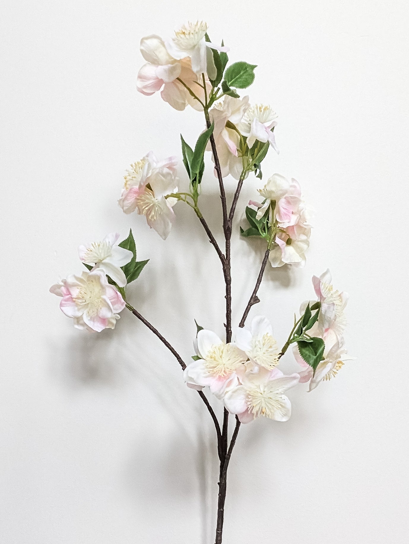 Life-like artificial cherry blossom stem with real touch petals with gradient of pink and white petals