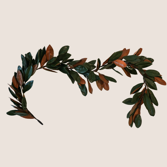 Artificial magnolia garland with glossy look of preserved garland.