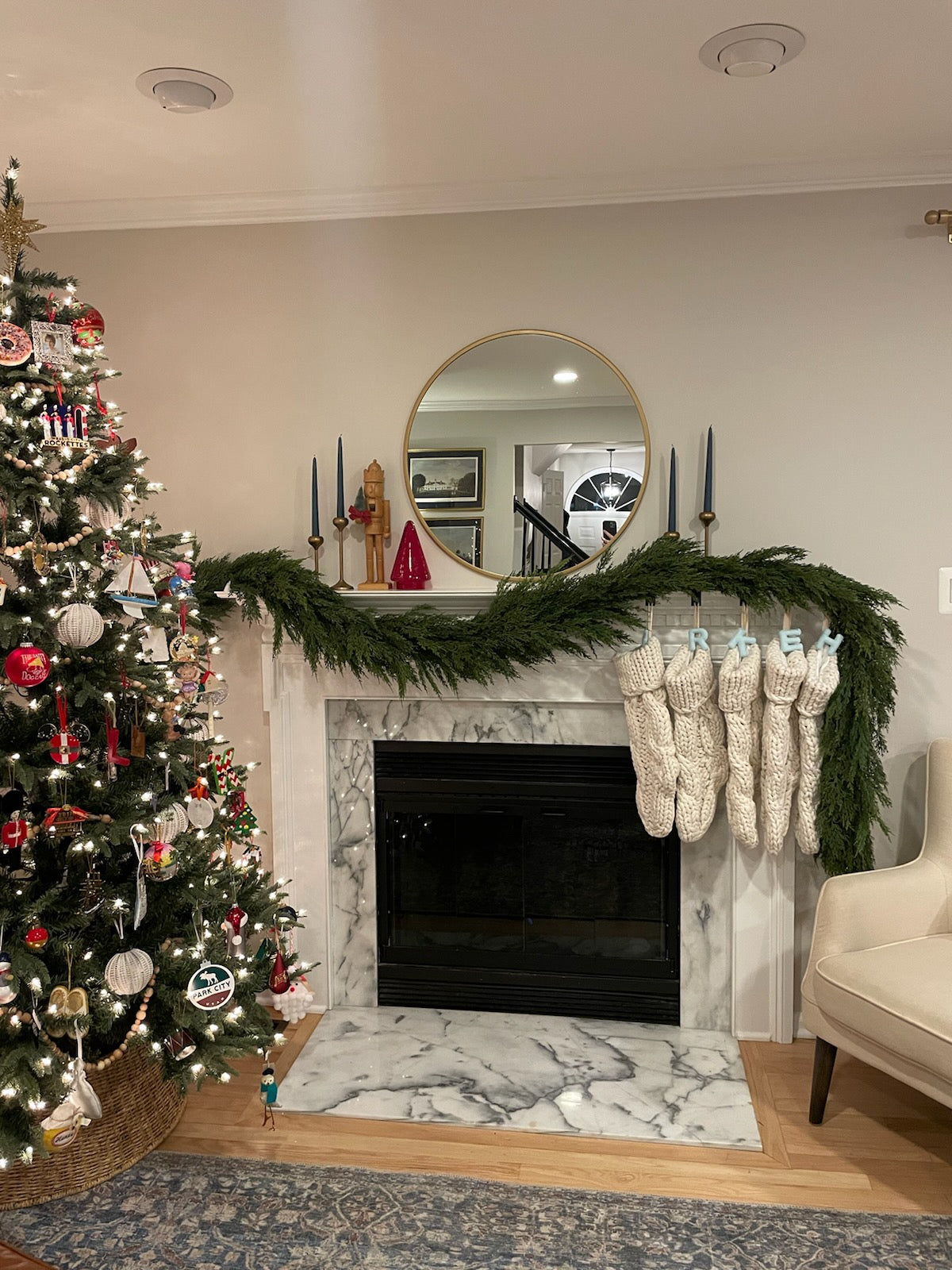 9 ft artificial cedar garland on mantle for Christmas home decor.