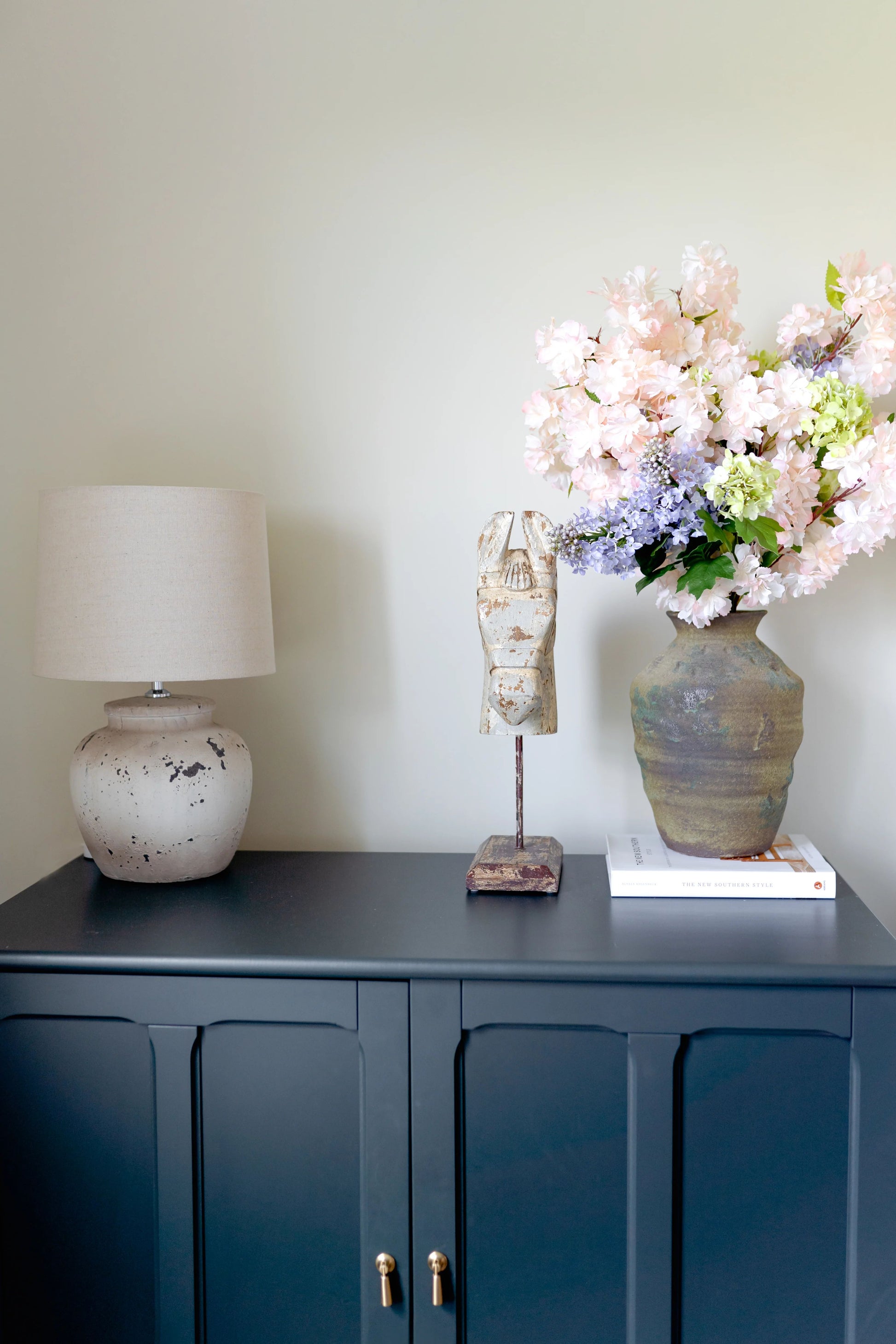 Natural dark black and brown terra cotta vase, 12 inches tall, with accents of blue to create vintage look.