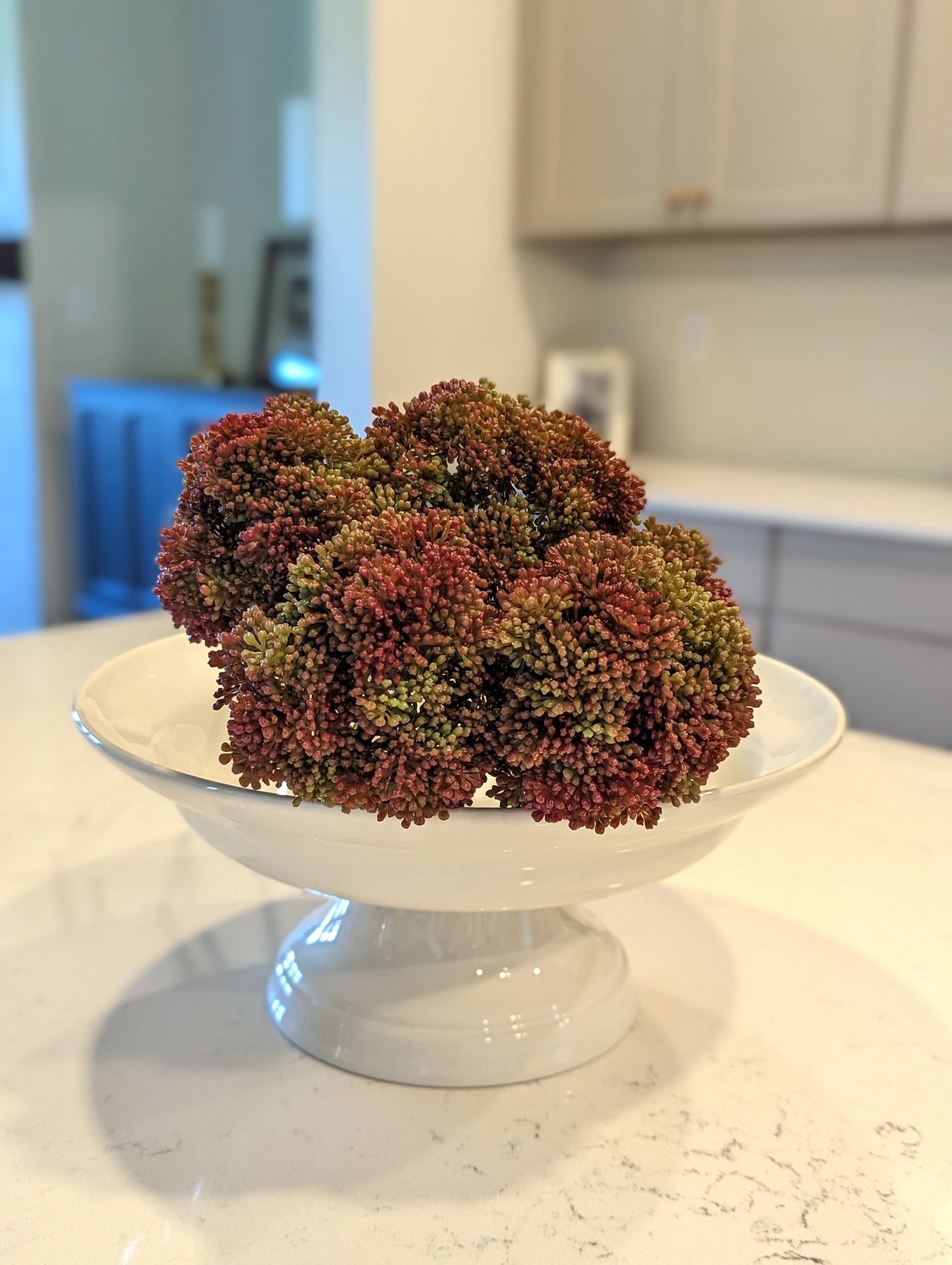 Bouquet of artificial  fall allium spray flowers in lifesetyle photo showcasing Fall home decor ideas.