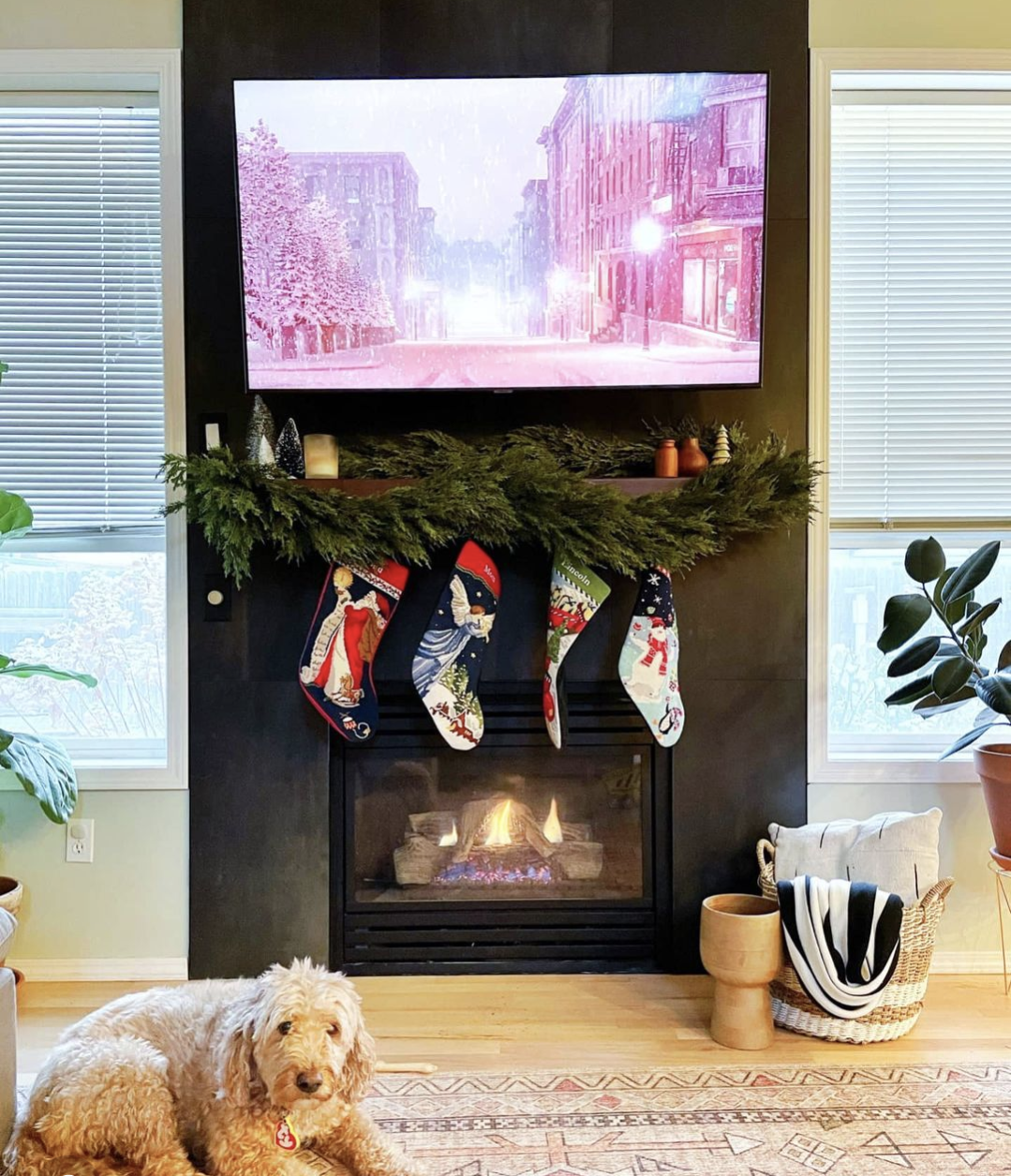 Image of 9 ft artificial real touch cedar garlands hanging on fireplace of home for holiday and Christmas decorating.