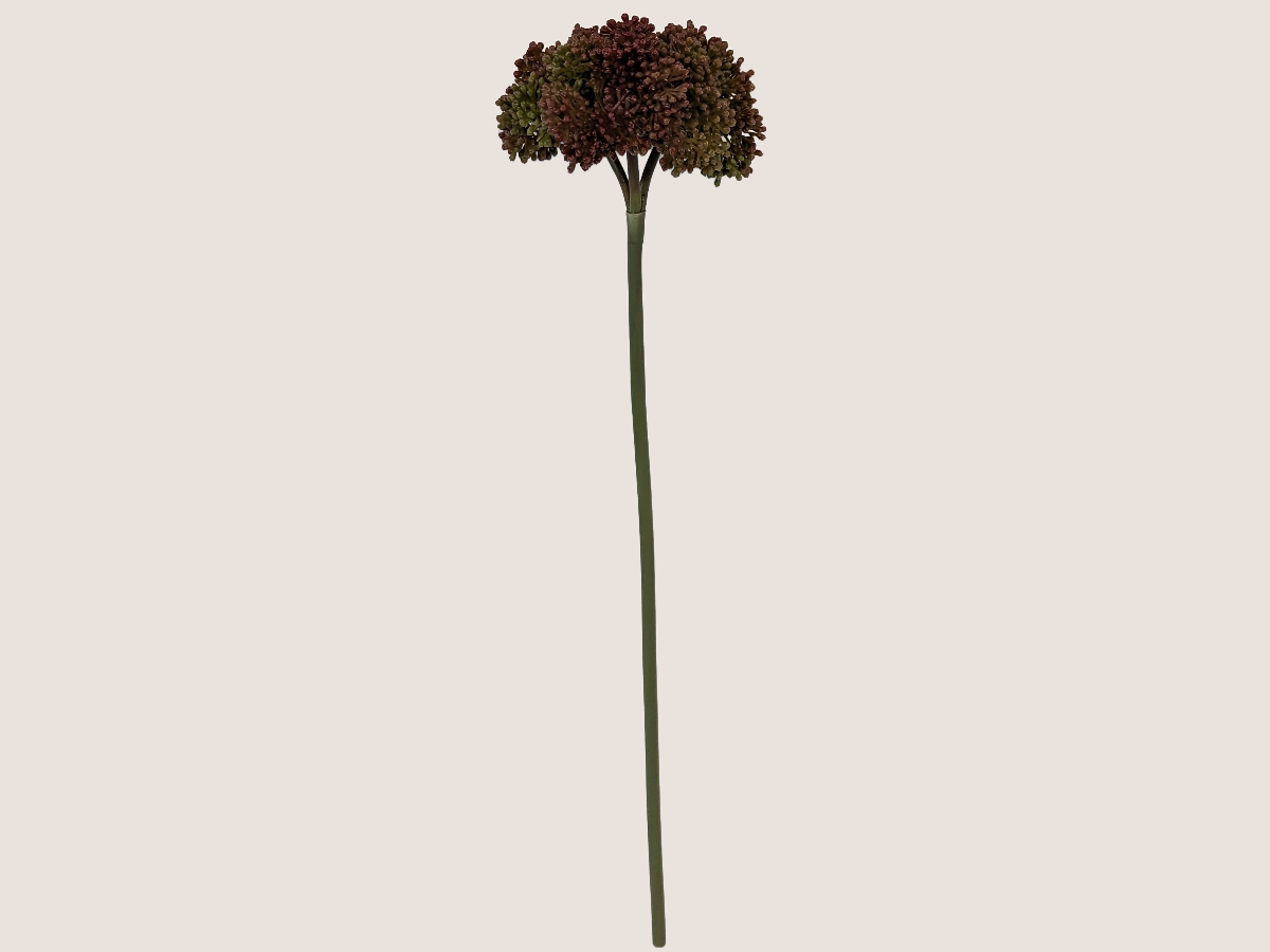 Artificial fall allium spray flower against a beige background showcasing green stem with prominently dark red blooms with gradient of green and brown creating lifelike faux flower.