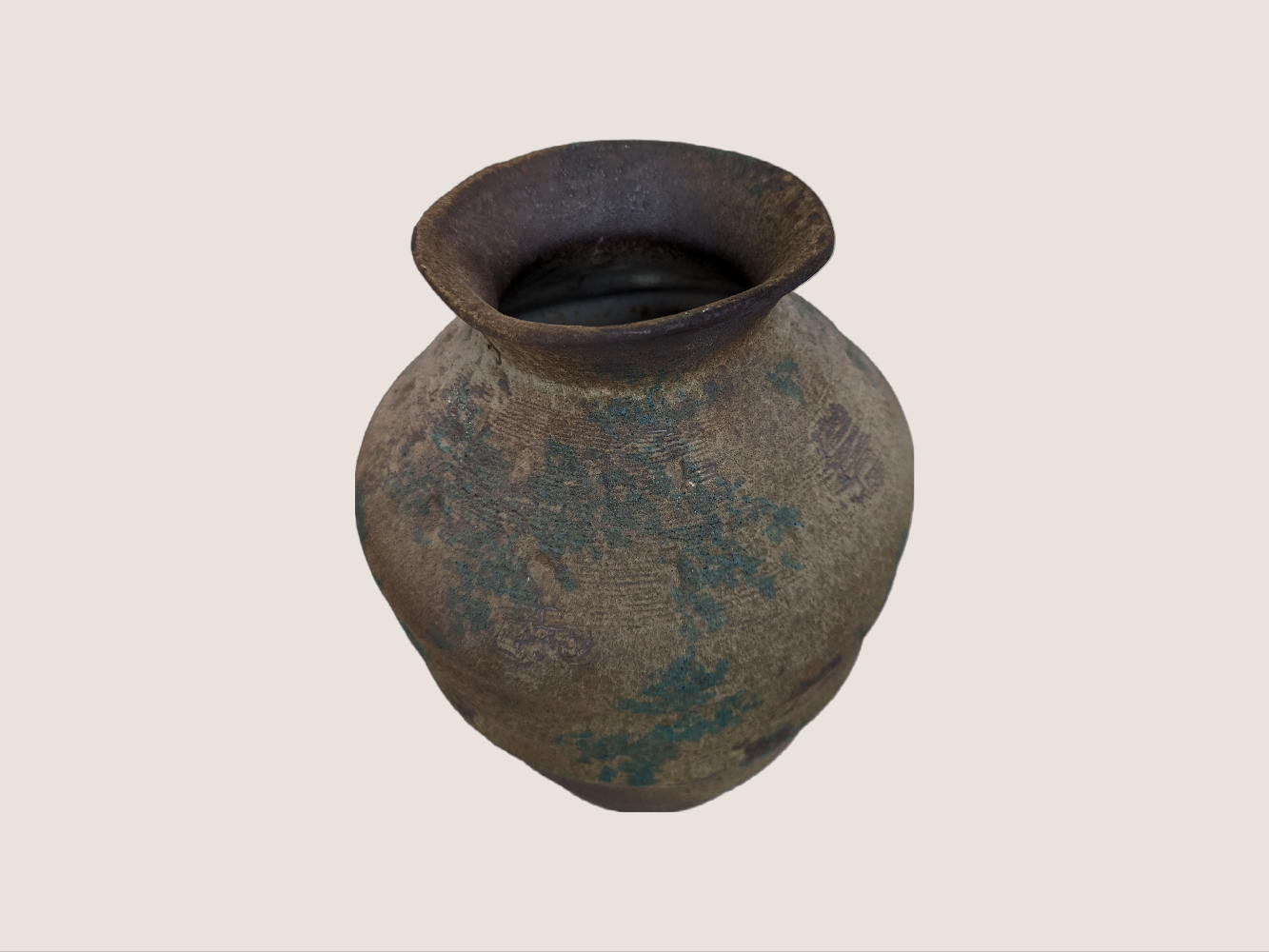 Antique look. Dark terra cotta vase, 12 inches tall in urn shape with brown color, with natural accents of gray, blue, and black.