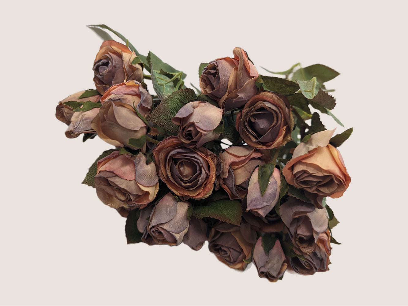 Artificial rose bouquet crafted to look preserved, with 5 stems each containing 5 flower heads in mauve pink, purples, and light browns creating a dried look. Each stem is 17 inches with a green to brown gradient, serrated leaves with dark red tips, and small artificial buds adding a lifelike look. The bouquet is pictured against a neutral beige background.